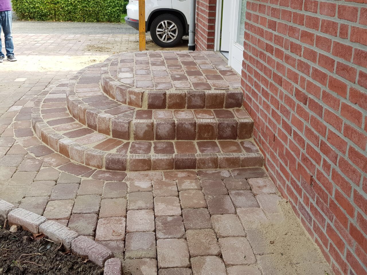 Erstellung Treppenanlage mit den Pflastersteinen Erstellung Treppenanlage mit den Pflastersteinen